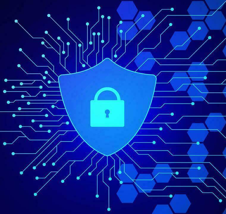 A blue digital illustration of a shield with a padlock in the center, surrounded by circuit lines and hexagonal patterns, symbolizes cybersecurity and data protection.